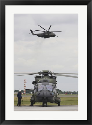 Framed German Army NH90 and its Predecessor, the CH-53 Sea Stallion Print