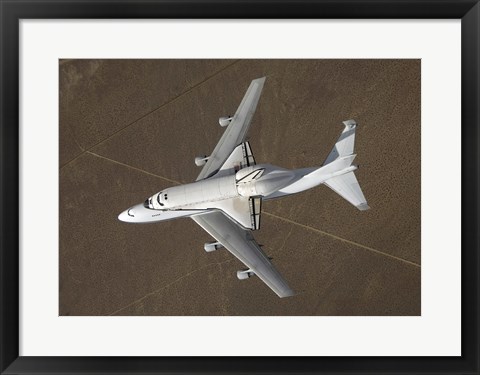 Framed overhead view of Atlantis Atop a Modified 747 Aircraft Print
