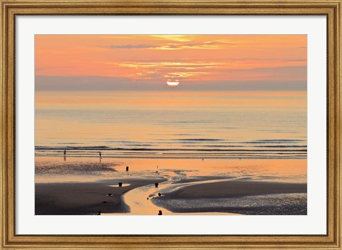 Framed Sunset and beach, Blackpool, England Print