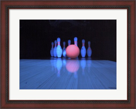 Framed Bowling ball with bowling pins Print