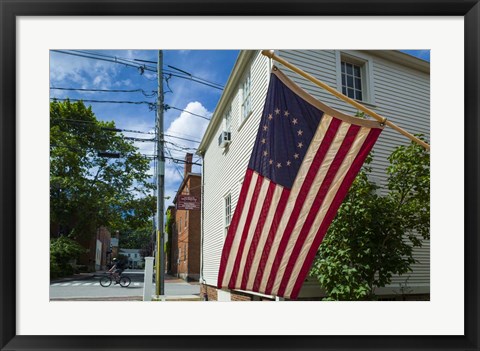 Framed New Hampshire, Portsmouth, Strawberry Banke Historic Area, building with US flag Print