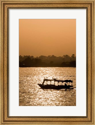 Framed Egypt, Luxor Water taxi at sunset Nile River Print