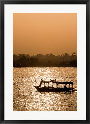 Framed Egypt, Luxor Water taxi at sunset Nile River Print