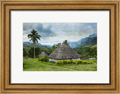 Framed Traditional thatched roofed huts in Navala, Fiji, South Pacific Print