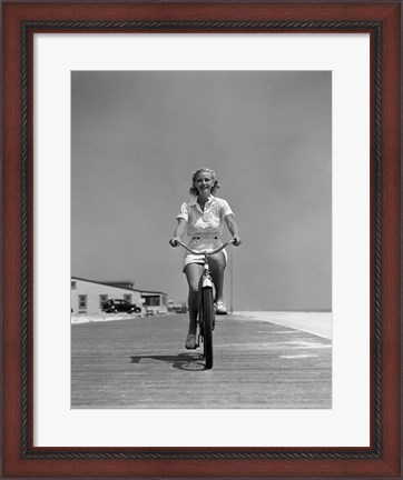 Framed 1940s Summer Time Smiling Woman Riding Bike On Beach Boardwalk Print