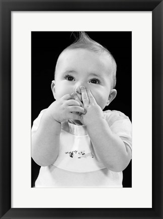 Framed 1950s Baby Covering Mouth With Hands Print