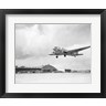 Low angle view of a military airplane landing, Douglas DC-3 (R693569-AEAEAGOFLM)