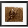 USA, Pennsylvania, Farmer on Tractor Plowing Field (R693844-AEAEAGOFLM)