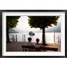 Panoramic Images - Couple sitting on bench and watching ferry approaching dock along the Lake Como, Bellagio, Province of Como, Lombardy, Italy (R782142-AEAEAGOFDM)