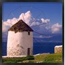 Ric Ergenbright / Danita Delimont - Greece, Mykonos, Windmill looks over Azure Sea (R826276-AEAAAAGADM)