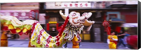 Framed Group of people performing dragon dancing on a road, Chinatown, San Francisco, California, USA Print