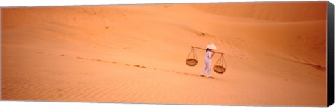 Framed Woman carrying panniers, Mui Ne, Vietnam Print