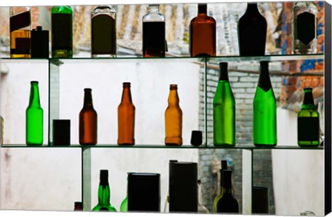 Framed Bottles displayed at foreigner bar, Old Town, Dali, Yunnan Province, China Print