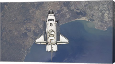 Framed Space Shuttle Atlanti Flying Above the Atlantic coast of Spain and the Gulf of Cadiz Print