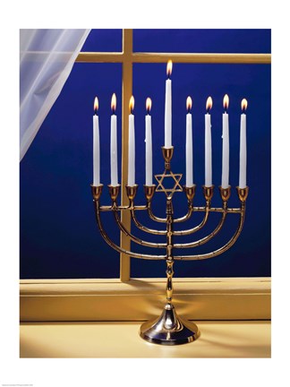 Framed Close-up of burning candles on a menorah at a window Print