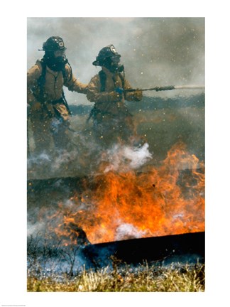 Framed Two firefighters extinguishing a fire Print