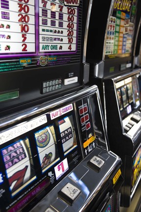 Framed Slot machines at an airport, McCarran International Airport, Las Vegas, Nevada, USA Print