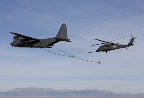 Framed HH-60G Pave Hawk Prepares  for Aerial Refueling from an HC-130 Print
