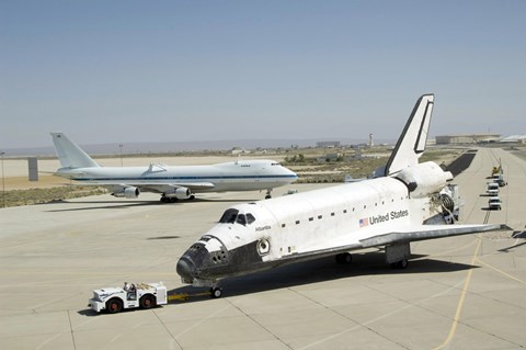 Framed Space shuttle Atlantis is Towed Past a Modified Boeing 747 Print