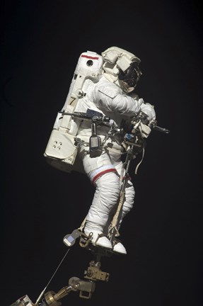 Framed Astronaut Attached to a Foot Restraint during Extravehicular Activity Print