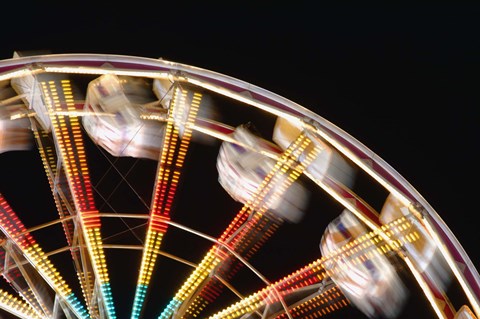 Framed Blurred Motion Carnival Ride at Night Print