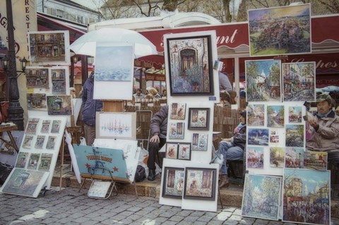 Framed Monmartre Artist Working On Place du Tertre II Print