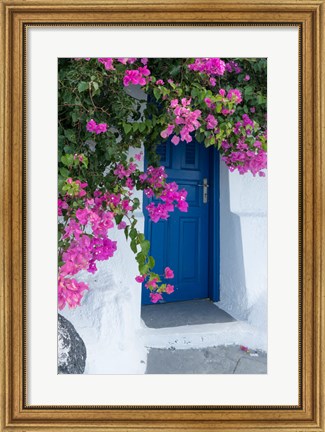 Framed Greece, Santorini A Picturesque Blue Door Is Surrounded By Pink Bougainvillea In Firostefani Print