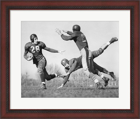 Framed Three Men Playing Football Print