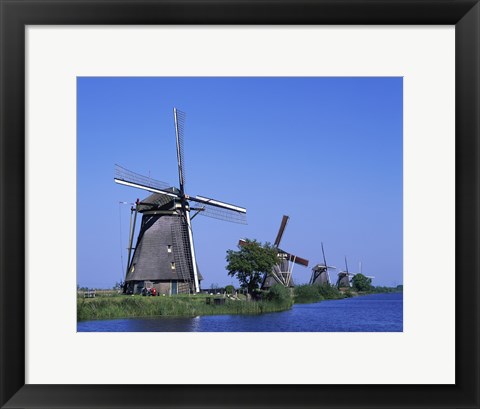 Framed Windmills along a river, Kinderdike, Amsterdam, Netherlands Print