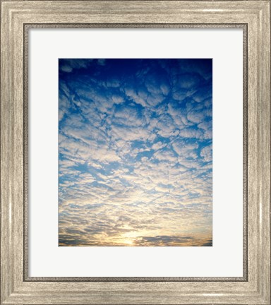 Framed Low angle view of sunrise seen through clouds Print