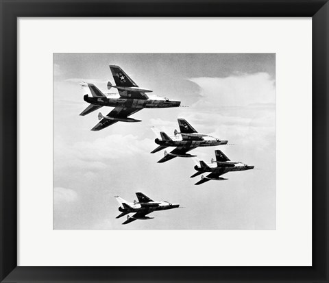 Framed Low angle view of four fighter planes flying in formation, F-100 Super Sabre Print