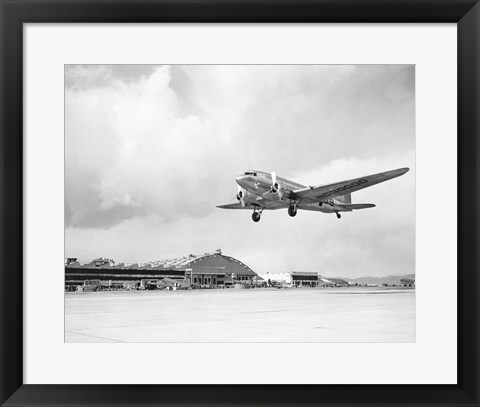 Framed Low angle view of a military airplane landing, Douglas DC-3 Print