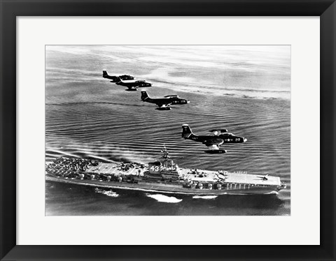 Framed High angle view of four fighter planes flying over an aircraft carrier, US Navy Banshees, USS Coral Sea (CV-43) Print