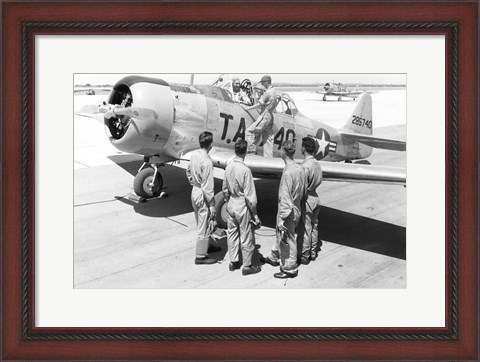 Framed Rear view of four soldiers standing near a fighter plane, T-6 Texan Print