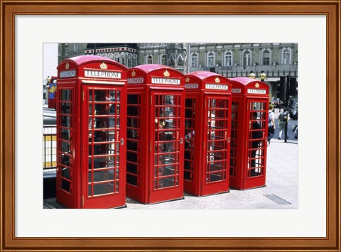 Framed Telephone booths in a row, London, England Print