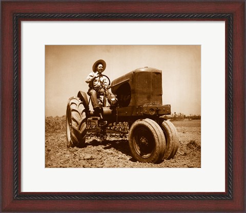 Framed Farmer Plowing a Field with a Tractor Print