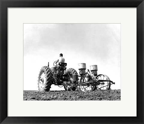 Framed Low Angle View of a Farmer Planting Corn with a Tractor in a Field Print