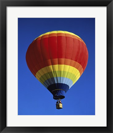 Framed Low angle view of a hot air balloon rising, Albuquerque International Balloon Fiesta, Albuquerque, New Mexico, USA Print