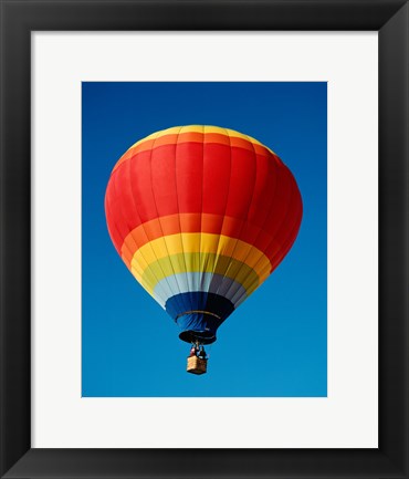 Framed Low angle view of a hot air balloon in the sky, New Mexico, Rainbow Print