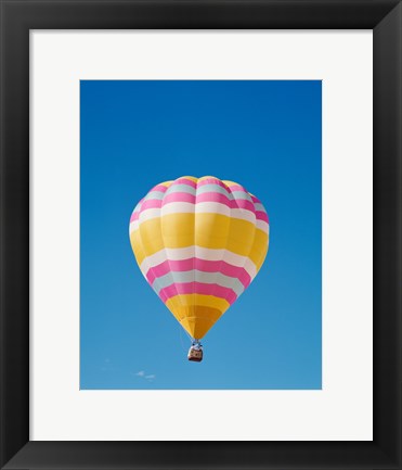 Framed Low angle view of a hot air balloon in the sky, Albuquerque, New Mexico, Yellow &amp; Pink Print