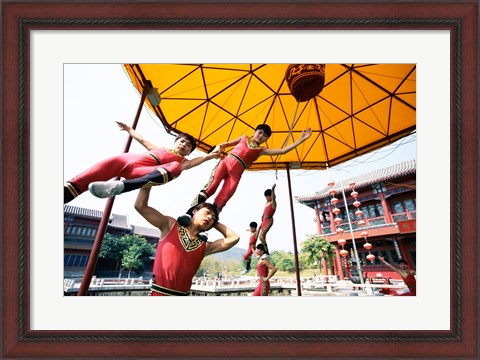 Framed Group of children performing acrobatics, Shanghai, China Print