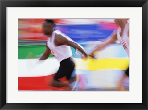 Framed Side profile of two young men passing a relay baton Print