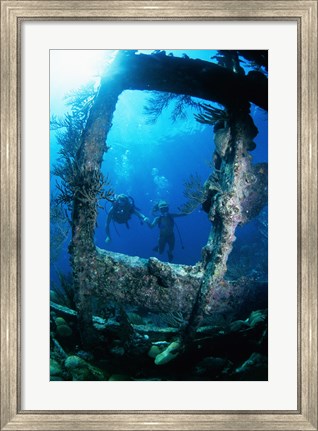 Framed Scuba diver investigating shipwrecks Print