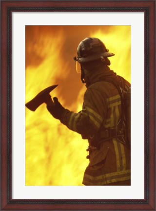 Framed Firefighter holding an axe Print