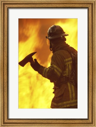 Framed Firefighter holding an axe Print