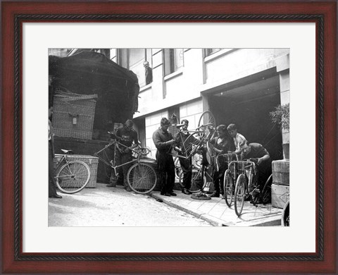 Framed Taking care of  maintenance of the racing bicycles during a rest day in Belfort Print