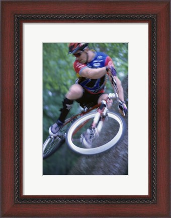 Framed Young man on a bicycle Print