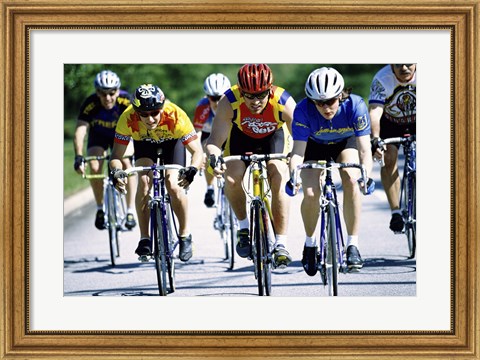 Framed Group of cyclists riding bicycles Print