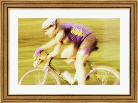 Framed Side profile of a young man cycling Print