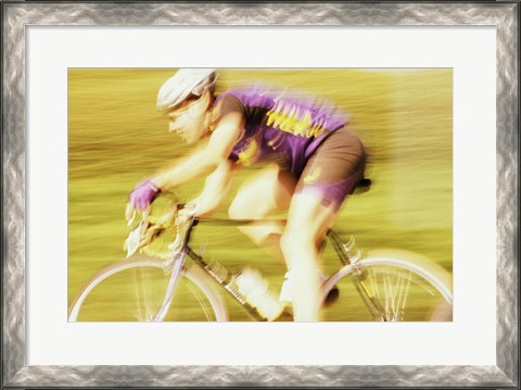 Framed Side profile of a young man cycling Print